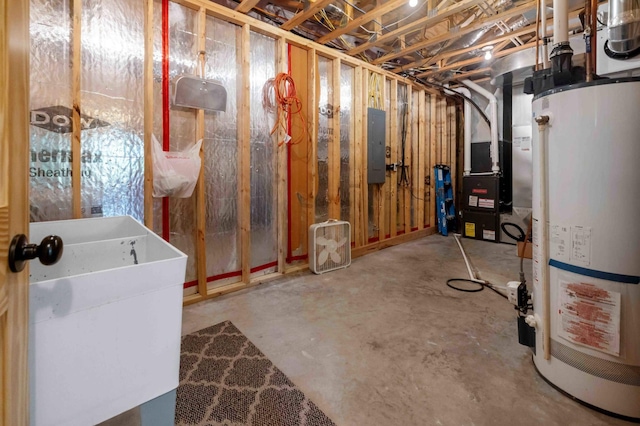 31172 Apache Cir, Breezy Point, MN 56472 - unfinished below grade area with gas water heater, electric panel, heating unit, and a sink