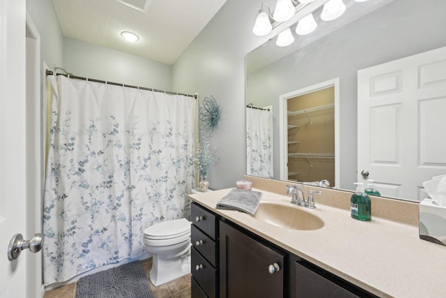 3157 Doneene Ln, Eagan, MN 55121 - bathroom featuring vanity, toilet, tile patterned floors, curtained shower, and a textured ceiling