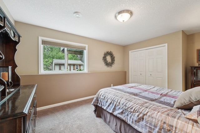 3157 Doneene Ln, Eagan, MN 55121 - bedroom featuring carpet, a closet, baseboards, and a textured ceiling