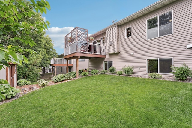 3157 Doneene Ln, Eagan, MN 55121 - rear view of property featuring a yard and a wooden deck