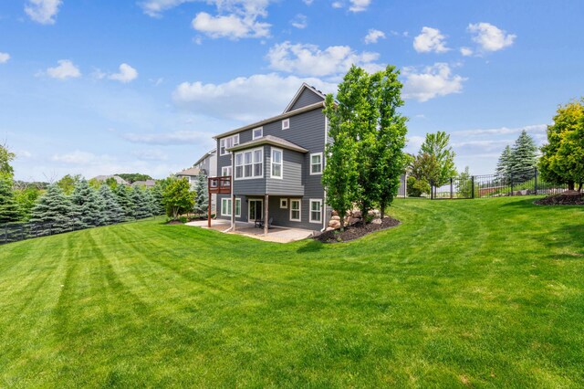 6005 Comstock Ln N, Plymouth, MN 55446 - back of house with a patio
