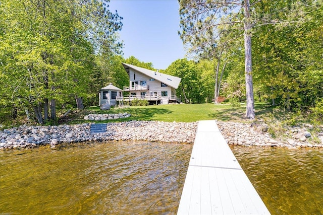 29008 Shore Ln, Lone Pine Twp, MN 55775 - dock with a water view and a lawn