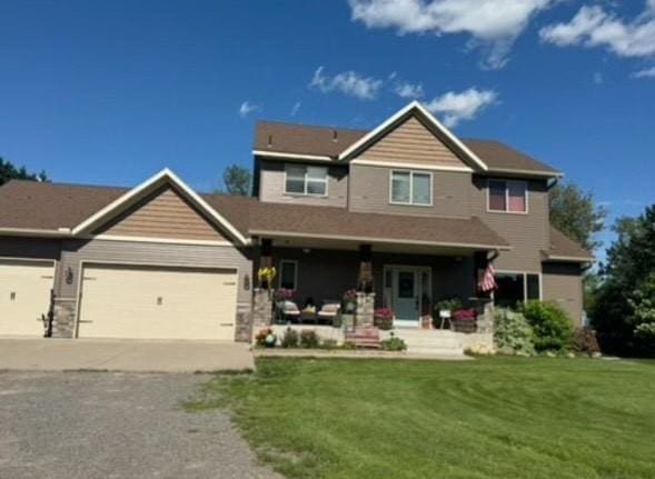 22592 43rd Ave, Saint Augusta, MN 56301 - craftsman-style house with a porch, a front yard, driveway, and a garage