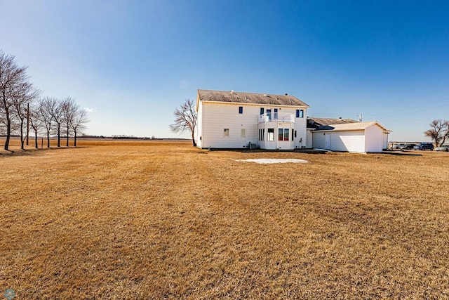 2717 88th Ave S, Fargo, ND 58104 - rear view of property with a lawn