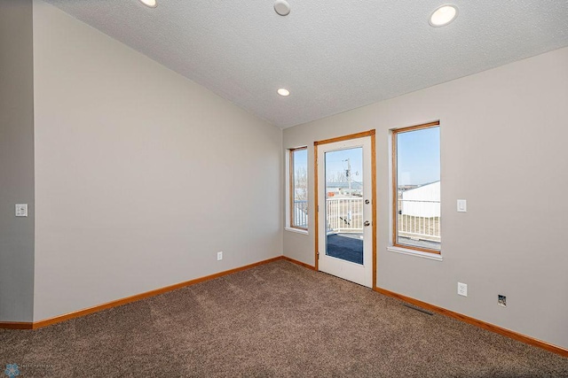 2717 88th Ave S, Fargo, ND 58104 - unfurnished room featuring carpet flooring, baseboards, a textured ceiling, and recessed lighting