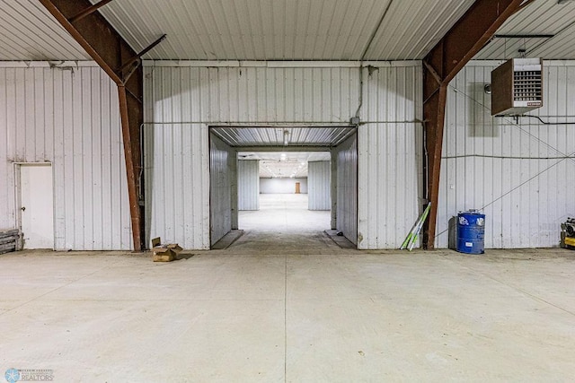 2717 88th Ave S, Fargo, ND 58104 - garage with metal wall and a heating unit