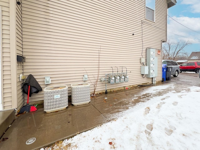1599 Rice St, Saint Paul, MN 55117 - view of property exterior with central AC unit