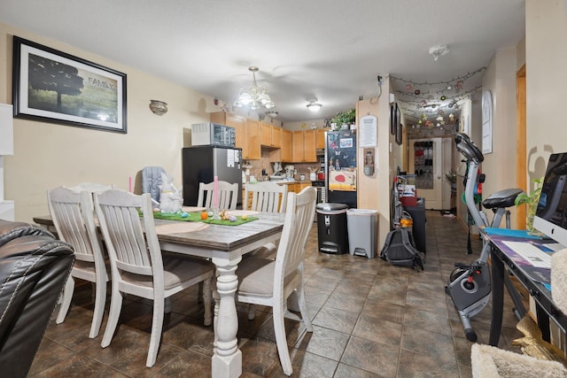 1599 Rice St, Saint Paul, MN 55117 - dining area with dark stone finish flooring