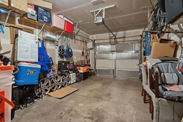 1599 Rice St, Saint Paul, MN 55117 - garage featuring a garage door opener