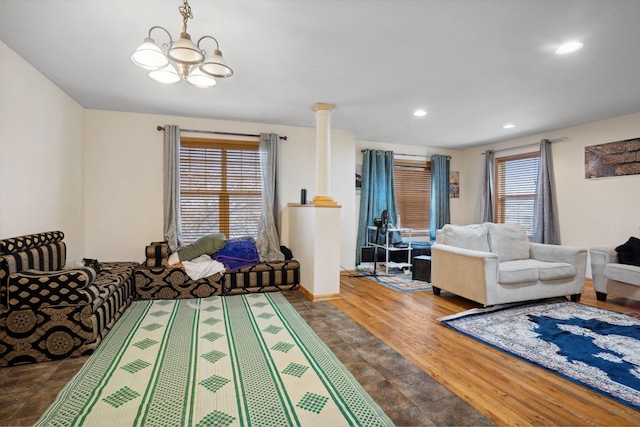 1599 Rice St, Saint Paul, MN 55117 - living room featuring a chandelier, recessed lighting, and wood finished floors