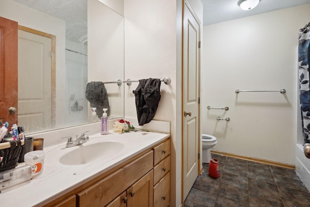1599 Rice St, Saint Paul, MN 55117 - bathroom with vanity, toilet, and baseboards