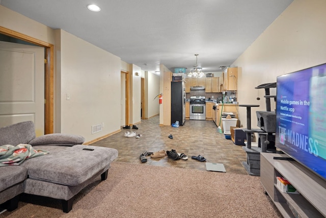 1599 Rice St, Saint Paul, MN 55117 - living area with a chandelier and recessed lighting