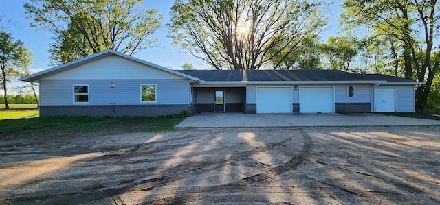 13386 Palomino Rd, Bertha Twp, MN 56437 - view of front of property featuring driveway and a garage