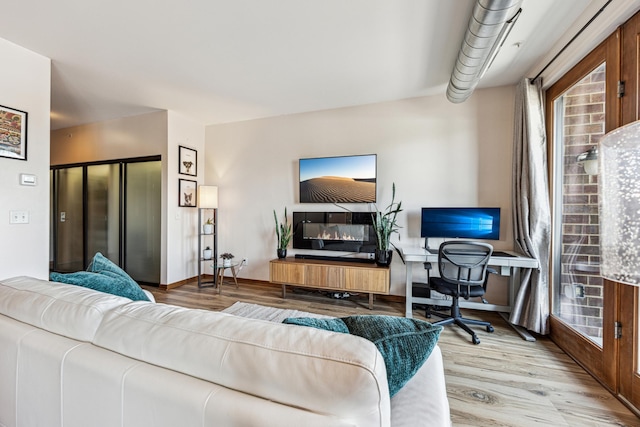 15 Franklin Ave Unit 312, Minneapolis, MN 55404 - living area with wood finished floors and an office area