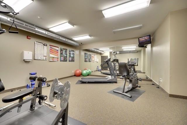 15 Franklin Ave Unit 312, Minneapolis, MN 55404 - exercise room featuring baseboards
