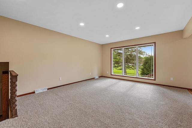 1930 6th Ave NE, Owatonna, MN 55060 - empty room with baseboards, carpet floors, and recessed lighting