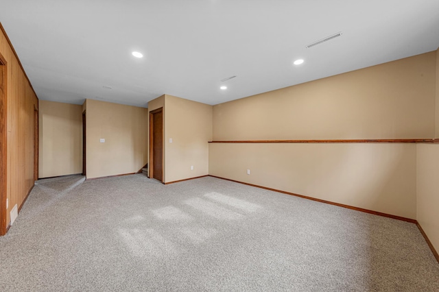 1930 6th Ave NE, Owatonna, MN 55060 - spare room with baseboards, light carpet, recessed lighting, and stairs
