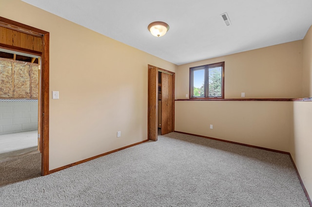 1930 6th Ave NE, Owatonna, MN 55060 - spare room with carpet floors and baseboards