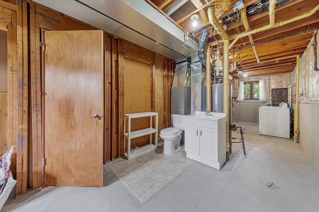 1930 6th Ave NE, Owatonna, MN 55060 - basement featuring washing machine and clothes dryer and a sink