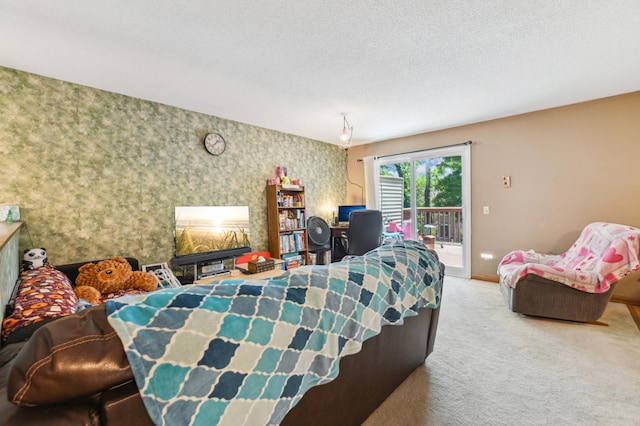 1351 4th St W, Hastings, MN 55033 - living room with carpet floors, wallpapered walls, and baseboards