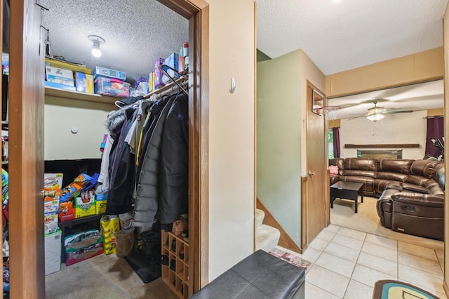 1351 4th St W, Hastings, MN 55033 - walk in closet featuring tile patterned floors and ceiling fan