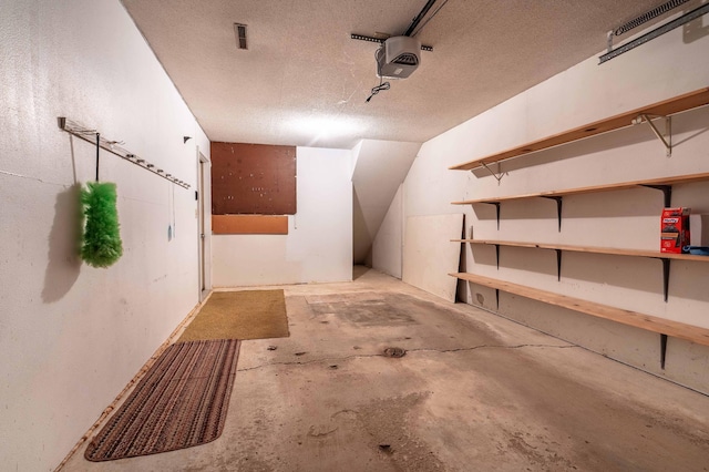 415 2nd Ave SE, Pelican Rapids, MN 56572 - garage featuring a garage door opener