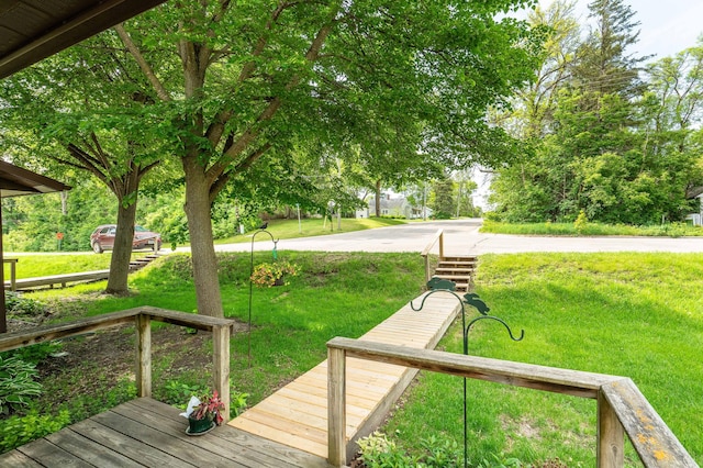 415 2nd Ave SE, Pelican Rapids, MN 56572 - wooden deck with a yard