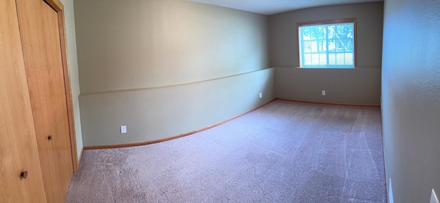 2434 1st St S, Saint Cloud, MN 56301 - spare room with carpet and baseboards
