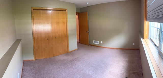 2434 1st St S, Saint Cloud, MN 56301 - unfurnished bedroom with carpet flooring and a closet