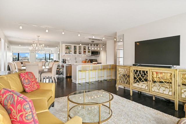 15 1st St Unit A1119, Minneapolis, MN 55401 - living room with dark wood finished floors and a chandelier