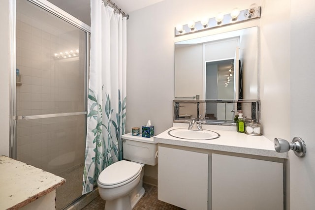 15 1st St Unit A1119, Minneapolis, MN 55401 - bathroom featuring vanity, toilet, a tile shower, and tile patterned flooring