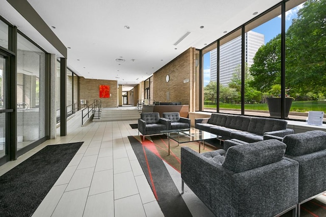 15 1st St Unit A1119, Minneapolis, MN 55401 - building lobby with brick wall and floor to ceiling windows