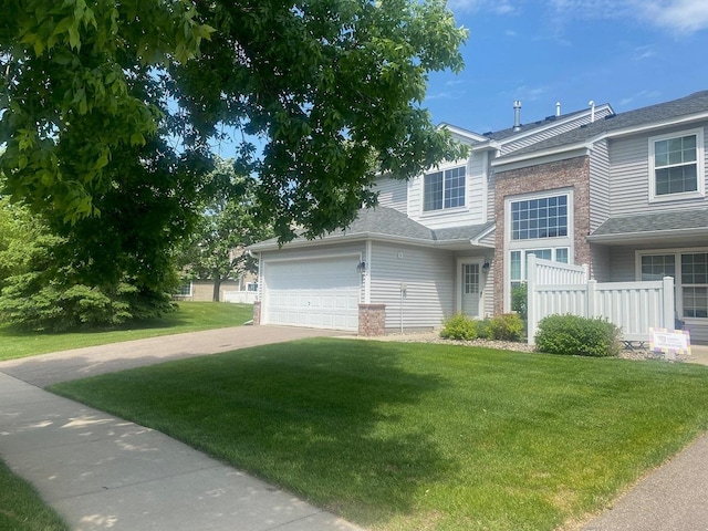 312 Wagon Wheel Ln, Chaska, MN 55318 - traditional-style house featuring concrete driveway and a garage