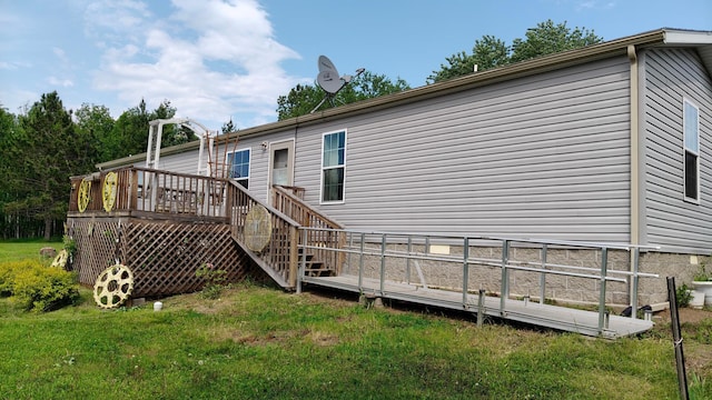 13786 188th Pl, Williams Twp, MN 56350 - back of property featuring a deck and a yard