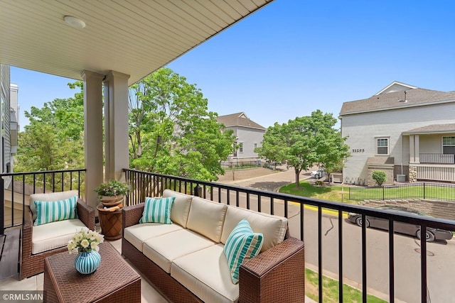 11206 Baltimore St NE Unit A, Blaine, MN 55449 - balcony featuring outdoor lounge area and a residential view
