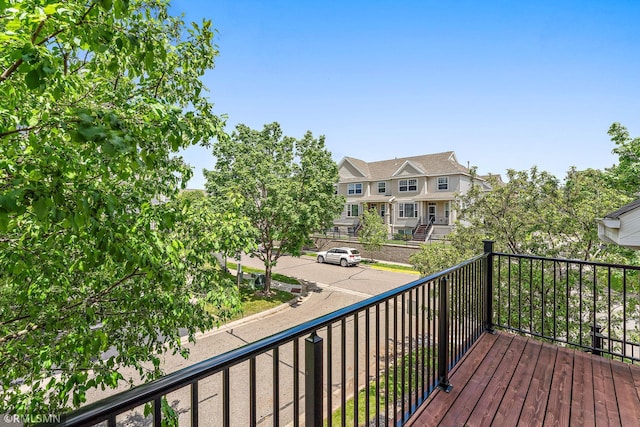 11206 Baltimore St NE Unit A, Blaine, MN 55449 - deck featuring a residential view