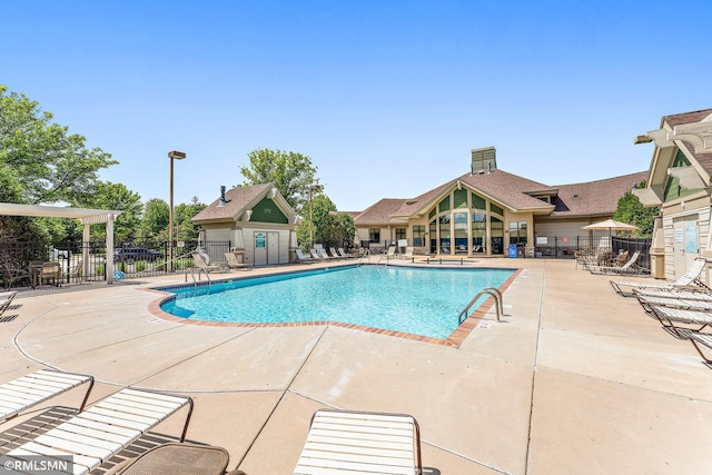11206 Baltimore St NE Unit A, Blaine, MN 55449 - community pool featuring a patio area