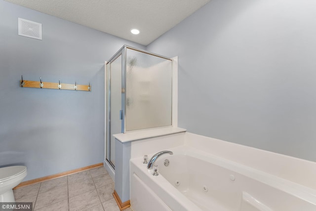 11206 Baltimore St NE Unit A, Blaine, MN 55449 - bathroom with a shower stall, a jetted tub, toilet, baseboards, and tile patterned flooring