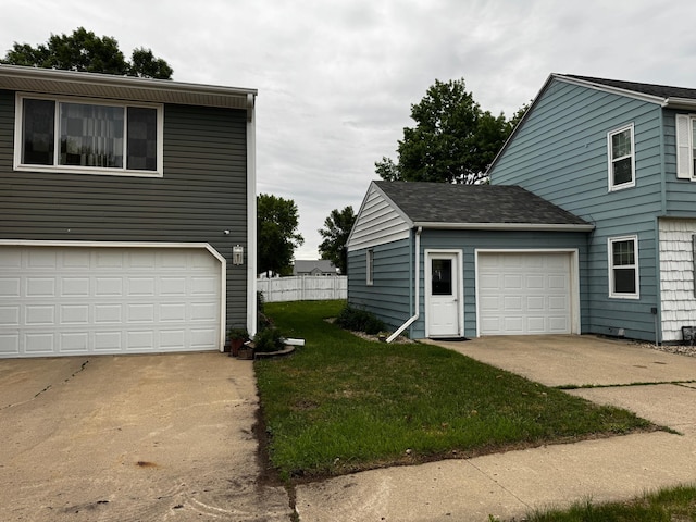 1110 Sherman St, Jackson, MN 56143 - garage featuring concrete driveway