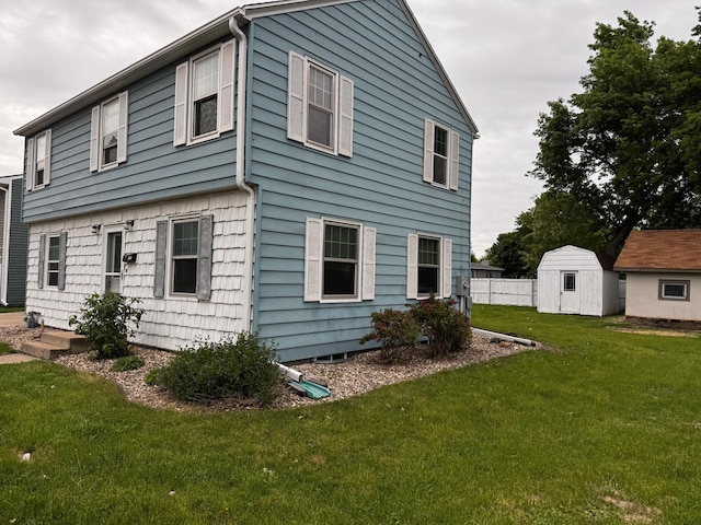 1110 Sherman St, Jackson, MN 56143 - back of house with a lawn