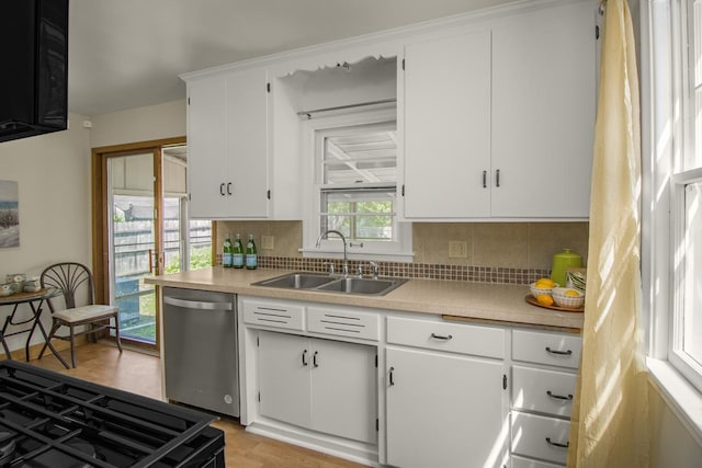 5349 47th Ave S, Minneapolis, MN 55417 - kitchen with stainless steel dishwasher, a sink, tasteful backsplash, light countertops, and white cabinetry