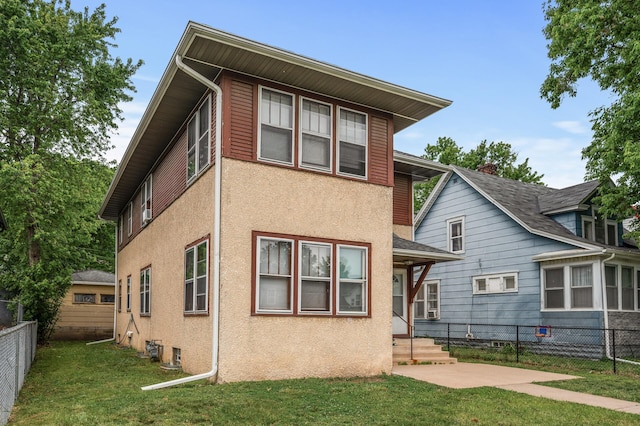 3725 Fremont Ave N, Minneapolis, MN 55412 - back of house featuring stucco siding