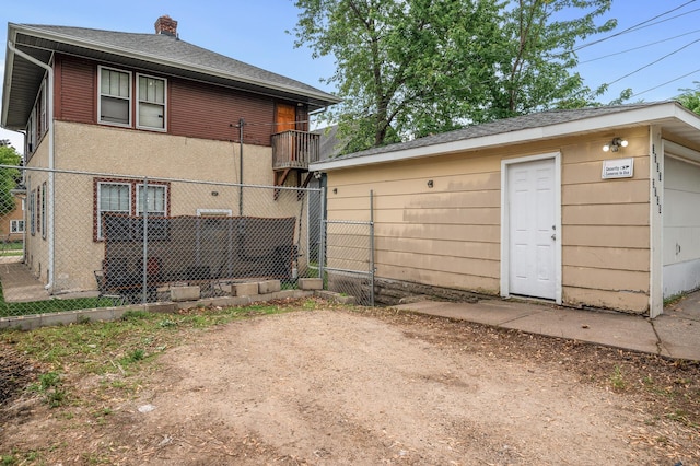 3725 Fremont Ave N, Minneapolis, MN 55412 - rear view of house with a chimney and a shingled roof