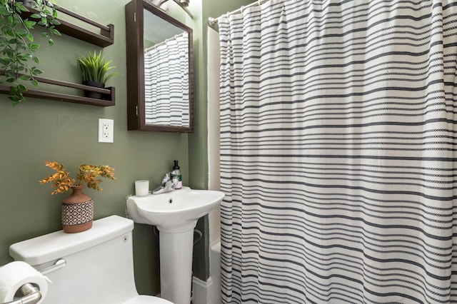 5236 42nd Ave S, Minneapolis, MN 55417 - bathroom featuring toilet and shower / bathtub combination with curtain