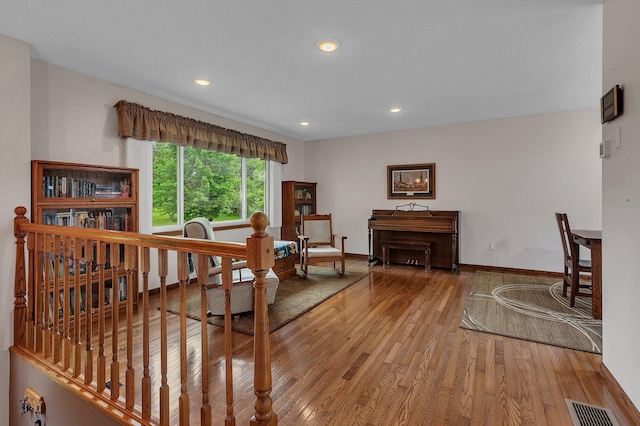 11236 207th Ave NW, Elk River, MN 55330 - living area featuring wood finished floors, recessed lighting, and baseboards