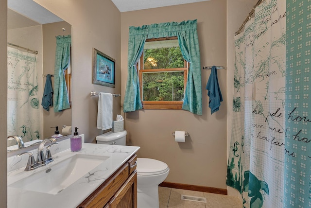11236 207th Ave NW, Elk River, MN 55330 - full bath with toilet, vanity, tile patterned floors, baseboards, and a shower with shower curtain