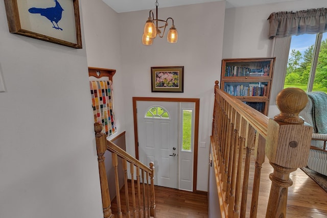 11236 207th Ave NW, Elk River, MN 55330 - foyer entrance with wood finished floors and a chandelier