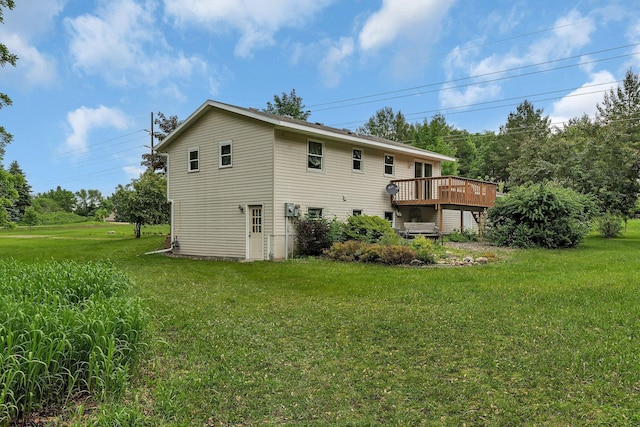 11236 207th Ave NW, Elk River, MN 55330 - back of property featuring a lawn and a wooden deck