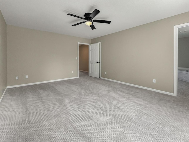 7658 Silver Lake Rd, Mounds View, MN 55112 - unfurnished bedroom with light colored carpet and baseboards