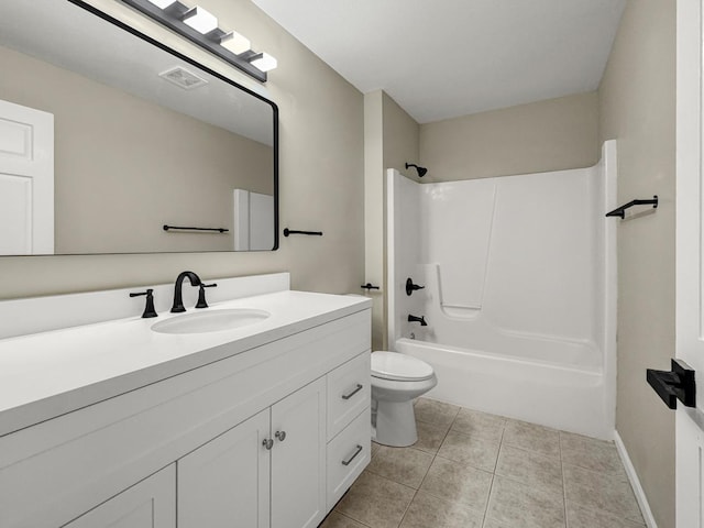 7658 Silver Lake Rd, Mounds View, MN 55112 - bathroom with vanity, tile patterned floors, toilet, and bathtub / shower combination
